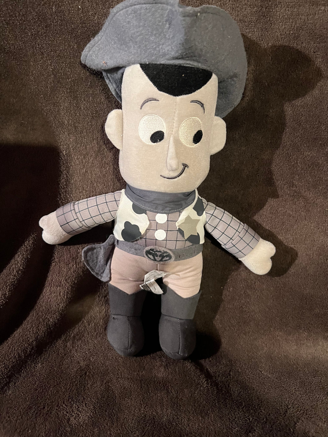 Disney Toy Story Monochrome Black and white Woody plush doll.